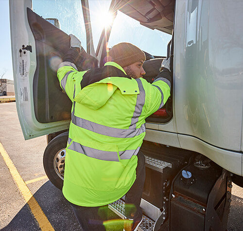 Driver Getting in Truck